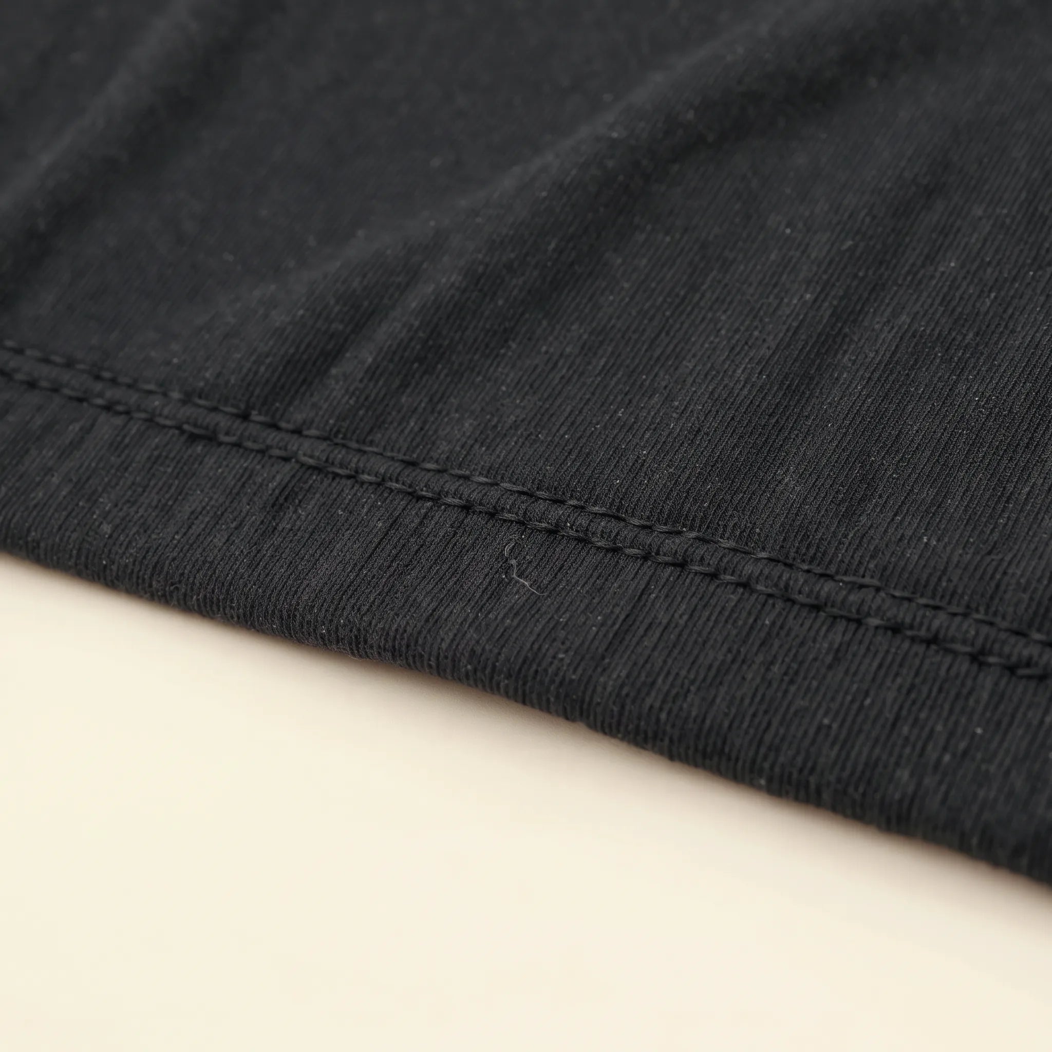 ātem seam detail, the clean flatlock stitch